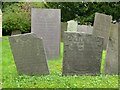 SK7935 : Belvoir Angel headstones. Redmile churchyard by Alan Murray-Rust