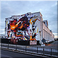 Littlewood Building with mural at sundown, Edge Lane, Liverpool