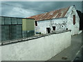 Whitewashed farm building alongside the A3 at Foyduff, Co Armagh