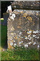 Benchmark on buttress of St Mary Magdalene Church