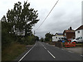 TL8719 : B1023 Inworth Road & Roadsign by Geographer