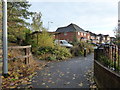 Newcastle-under-Lyme: footpath emerging onto housing estate