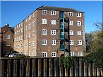TF4609 : Former warehouse on the bank of The River Nene, Wisbech by Richard Humphrey