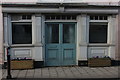 Old pub door and window in Cross Street