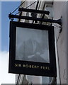 Faded sign for the Sir Robert Peel public house