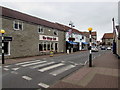 Zebra crossing on a slight hump, Farm Road, Street, Somerset