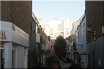 TQ2481 : View of coloured houses in Alba Place from Portobello Road by Robert Lamb
