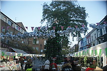TQ2481 : View of the Portobello Road Winter Festival in Tavistock Square by Robert Lamb