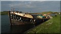 L9784 : Boat wreck, Westport Harbour by Colin Park