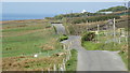 L7185 : Clare Island - The road west from the harbour by Colin Park