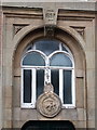 1857 emblem plaque on the pumping station