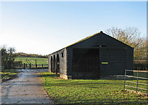 TL4157 : Wheatcases Barn and Red Meadow Hill by John Sutton