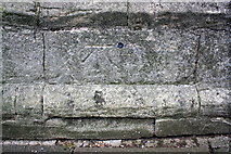 SK7953 : Benchmark on buttress of St Mary Magdalene's Church by Roger Templeman