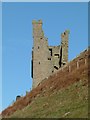 NU2521 : Lilburn Tower, Dunstanburgh Castle by Alan Murray-Rust