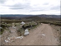 NO6085 : Bulldozed road, Cairn of Edendocher by Richard Webb