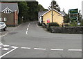 A487 direction signs facing the A493 at the edge of Pont ar Ddyfi, Gwynedd