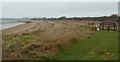 SU7502 : Thorney Island coast and memorial bench by Rob Farrow