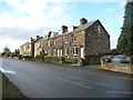 Houses on the west side of High Street [B6273]