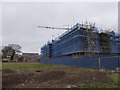 Constructing apartments, Exeter