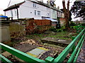 Fenced-off small graveyard near High Street, Stonehouse