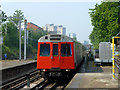 Eastbound District Line train at Upton Park