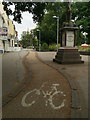 Sinuous cycleway snakes past the Starley statue, Greyfriars Green, Coventry