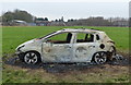 SK5808 : Burnt out car at Mowmacre Hill, Leicester by Mat Fascione