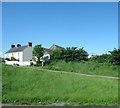 Traditional farmhouse above the A28 south of Market Hill