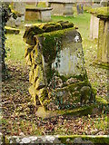 SO5923 : Weathered gravestone by Jonathan Billinger