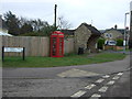 Telephone box and bus shelter on Station Road, Over