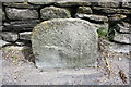 SE1289 : Boundary stone on NE side of A684 by Roger Templeman