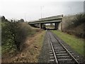 View from a Bury-Rawtenstall steam train - Passing under A56