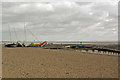 Nine sailing dinghies on a slipway by the Thames estuary at Southend