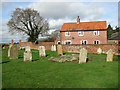 House beside Marsham churchyard