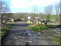 Footpath 105 on an access track off New Hey Road, Rastrick