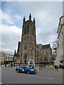 Boy racer and parish church