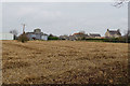 Field and farm buildings on the edge of Newton Kyme