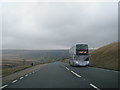 A62 with Manchester bound bus climbing up from Marsden