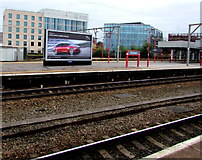 SJ8989 : Jaguar XE advert on Stockport railway station by Jaggery