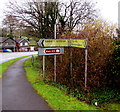 Directions and distances signs on an Upper Cwmbran corner