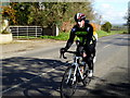 A passing cyclist, Beragh