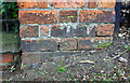 Benchmark on brick post outside #55 Barrowby Road