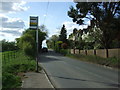 Bus stop on the B1455 near Holwell Manor