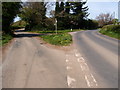 SP3835 : Road junction and grass triangle by Michael Trolove