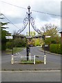 Village pump and signpost