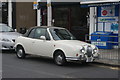 View of a Daimler classic car on Roding Lane South