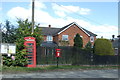 Elizabeth II postbox and telephone box on Straight Road, Polstead Heath