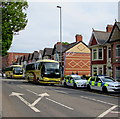 Police cars and football supporters club coaches, Corporation Road, Newport