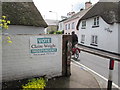 Vote poster on a Station Road wall, Sidmouth