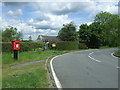 Elizabeth II postbox on Mill Road, Rowney Corner